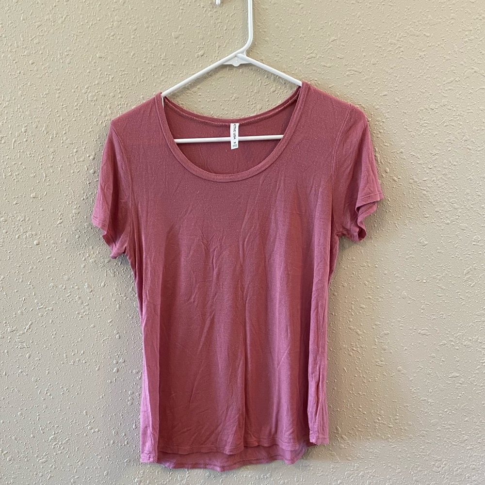 Pink short sleeve shirt. Size medium